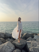 Side profile of the Caletta 100% Cotton Long Chemise, buttoned as a classic summer dress for a chic look.
