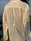 Close-up back view of Caletta Chemise yoke and stitching, highlighting the sheer, breathable cotton texture.