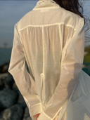 Close-up back view of Caletta Chemise yoke and stitching, highlighting the sheer, breathable cotton texture.